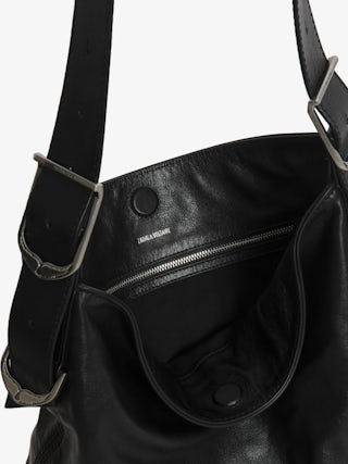 Jane Hobo Bag - Laid-back elegance with a rock ‘n’ roll twist. The Jane hobo bag blends soft, slouchy leather with signature edgy details, featuring the iconic debossed wings on the front for a bold statement. Designed for versatility, its adjustable strap lets you wear it your way—crossbody, shoulder, or effortlessly in hand. An everyday essential, always with an attitude.