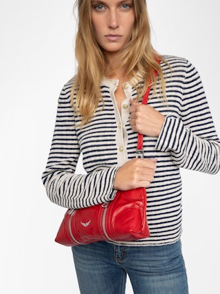 Sunny Moody Vintage Patent Bag - Vintage patent leather bag with adjustable shoulder strap and wing signature.