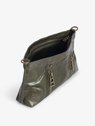 Sunny Moody Vintage Patent Bag - Vintage-inspired patent leather bag with adjustable strap and wing signature.