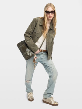 Sunny Moody Vintage Patent Bag - Vintage-inspired patent leather bag with adjustable strap and wing signature.