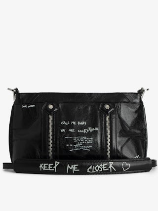 Sunny Moody Bag - Vintage-effect patent leather bag with graffiti, adjustable shoulder strap, and signature metal wings.