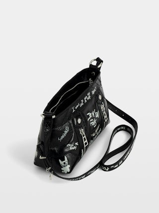 Sac Sunny Mood - Petit sac en cuir vernis effet vintage tagué, à bandoulière ajustable et signature ailes.