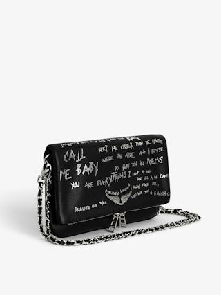 Rock Clutch - Graffiti-printed grained leather clutch with double chain in leather and metal, and wings adorned with rhinestones.