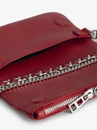 Pochette Rock Nano - Pochette en cuir grainé Cherry avec ailes signatures ornées de strass.