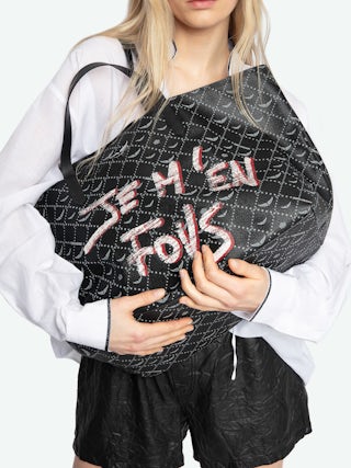 Z Monogram XL Shopper Graffiti Tote Bag - Urban rebellion meets Parisian luxury in this graffiti tote bag designed in coated monogram canvas. The bold, tagged print and signature wings bring rock-inspired edge to an everyday essential. With double handles for versatility and a spacious interior, this graffiti tote bag is perfect for carrying your world in style, whether for city errands, weekend escapes, or statement-making moments.