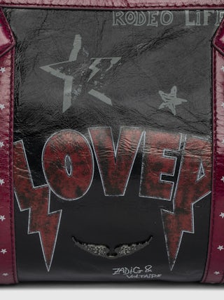 Sunny Moody Punk Bag - Vintage-inspired patent leather bag with adjustable shoulder strap and wing signature.