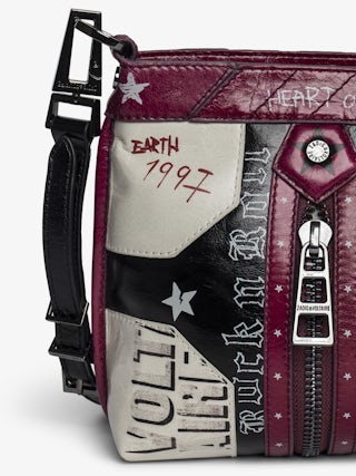 Sunny Moody Punk Bag - Vintage-inspired patent leather bag with adjustable shoulder strap and wing signature.