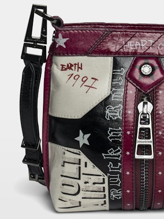 Sunny Moody Punk Bag - Vintage-inspired patent leather bag with adjustable shoulder strap and wing signature.