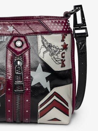 Sunny Moody Punk Bag - Vintage-inspired patent leather bag with adjustable shoulder strap and wing signature.