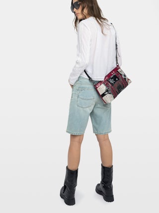 Sunny Moody Punk Bag - Vintage-inspired patent leather bag with adjustable shoulder strap and wing signature.