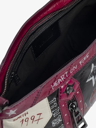 Sunny Moody Punk Bag - Vintage-inspired patent leather bag with adjustable shoulder strap and wing signature.