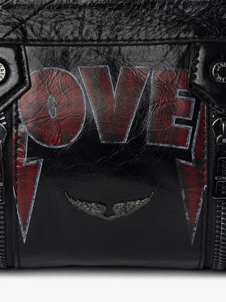 Sunny Mood Punk Bag - Small vintage-inspired patent leather bag with adjustable shoulder strap and punk wings and tag signature.