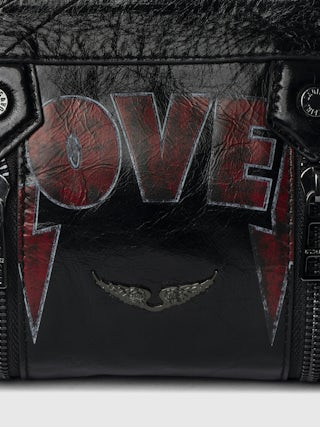 Sunny Mood Punk Bag - Small vintage-inspired patent leather bag with adjustable shoulder strap and punk wings and tag signature.