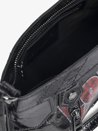 Sunny Mood Punk Bag - Small vintage-inspired patent leather bag with adjustable shoulder strap and punk wings and tag signature.