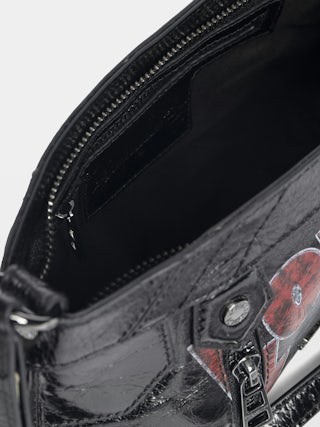 Sunny Mood Punk Bag - Small vintage-inspired patent leather bag with adjustable shoulder strap and punk wings and tag signature.