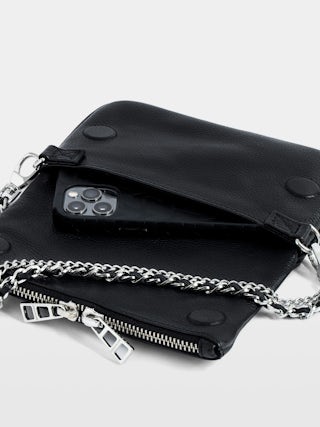 Rock Nano Clutch - Grained leather clutch with double leather and metal chains and rhinestone-adorned wings.
