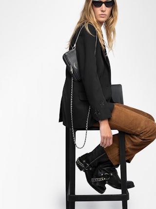 Rock Nano Clutch - Grained leather clutch with double leather and metal chains and rhinestone-adorned wings.