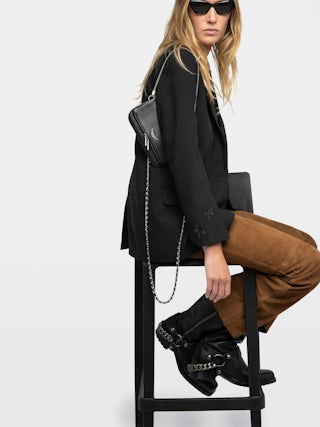 Rock Nano Clutch - Grained leather clutch with double leather and metal chains and rhinestone-adorned wings.