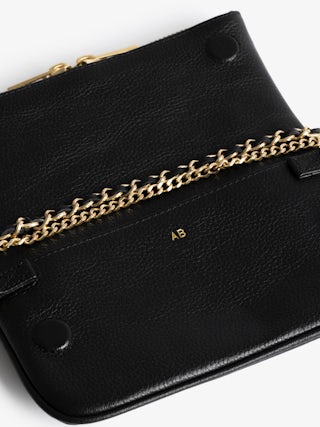 Rock Nano Clutch - Grained leather clutch with double leather and metal chains and rhinestone-adorned wings.