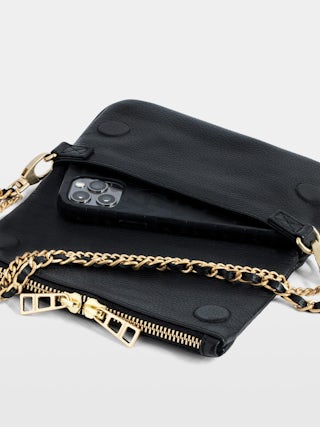Rock Nano Clutch - Grained leather clutch with double leather and metal chains and rhinestone-adorned wings.