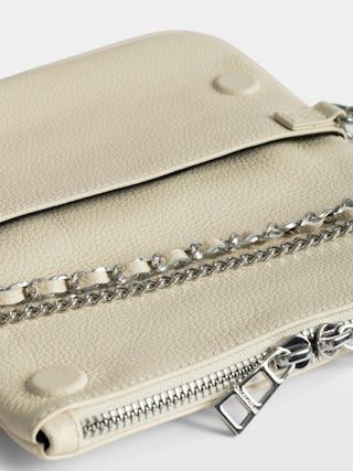 Rock Nano Clutch - Clutch in grained leather with double leather and metal chains and wings adorned with rhinestones.
