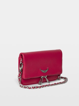 Rock Nano Clutch - Grained leather pochette with double leather and metal chains and rhinestone-adorned wings.