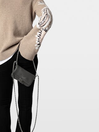 Rock Nano Clutch - Grained leather clutch with double leather and metal chains and wings adorned with rhinestones.