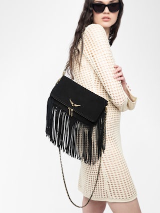 Rock Suede Fringes Clutch - clutch in suede with double leather and metal chain and wings adorned with rhinestones.