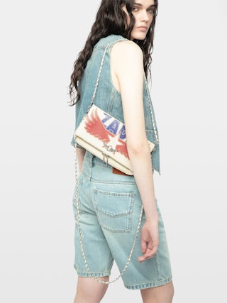 Rock America Clutch - Grained leather clutch with double leather and metal chain and rhinestone-embellished wings.