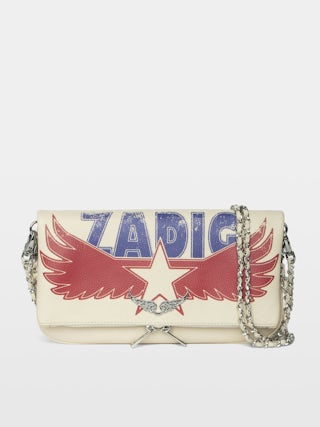Rock America Clutch - Grained leather clutch with double leather and metal chain and rhinestone-embellished wings.