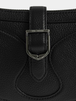 Moonrise Bag - Baguette bag in grained leather with signature wings.