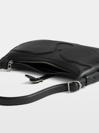 Moonrise Bag - Baguette bag in grained leather with signature wings.