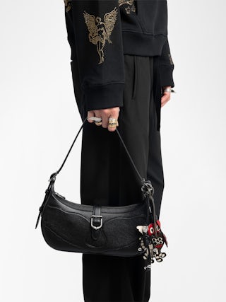 Moonrise Bag - Baguette bag in grained leather with signature wings.