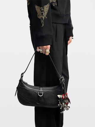 Moonrise Bag - Baguette bag in grained leather with signature wings.