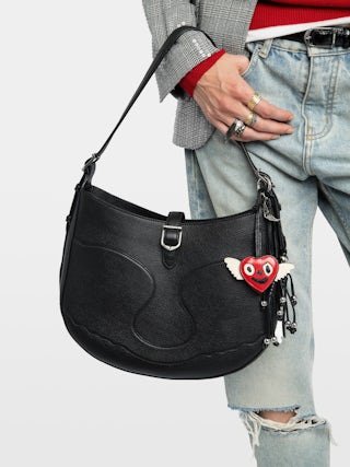 Moonrise Hobo Bag - Hobo bag in grained leather with signature wings.