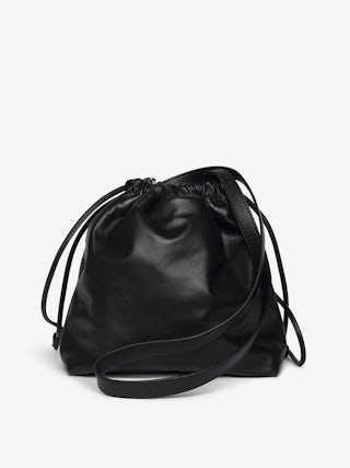 Rock Today Bag - Lambskin leather bag with chain strap and wing signature.