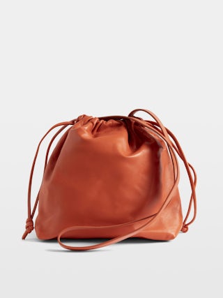 Rock Today Bag - Lambskin leather bag with chain shoulder strap and wings signature.