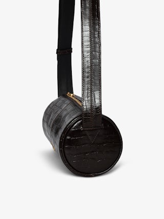 Le Doudou Croco Bag - Small croco-effect leather bag with adjustable shoulder strap and signature wings.