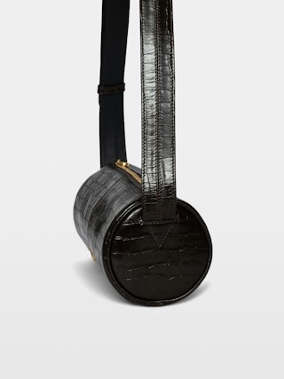 Sac Le Doudou Croco - Petit sac en cuir effet croco, à bandoulière ajustable et ailes signature.