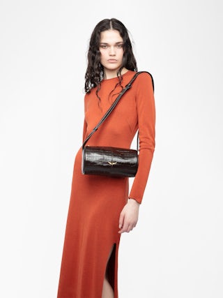 Le Doudou Croco Bag - Small croco-effect leather bag with adjustable shoulder strap and signature wings.