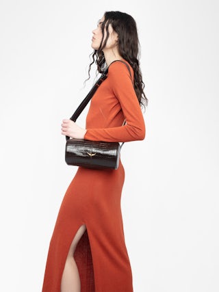 Le Doudou Croco Bag - Small croco-effect leather bag with adjustable shoulder strap and signature wings.