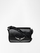 Sac Le Zazi Vintage Patent - Petit sac en cuir vernis effet inspiré vintage, à bandoulière ajustable et ailes signature.