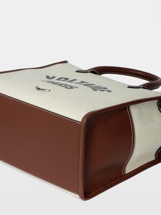 Angel Tote - Canvas and grained leather tote bag with double handles, shoulder strap and wing signature.