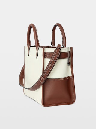 Angel Tote - Canvas and grained leather tote bag with double handles, shoulder strap and wing signature.