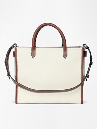 Angel Tote - Canvas and grained leather tote bag with double handles, shoulder strap and wing signature.