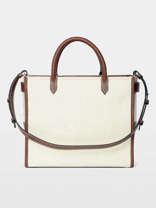 Angel Tote - Canvas and grained leather tote bag with double handles, shoulder strap and wing signature.