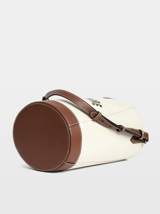 Z Bucket Voltaire Bag - Canvas and grained leather bucket bag with adjustable strap and wing signature.