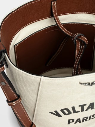 Z Bucket Voltaire Bag - Canvas and grained leather bucket bag with adjustable strap and wing signature.