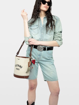Z Bucket Voltaire Bag - Canvas and grained leather bucket bag with adjustable strap and wing signature.