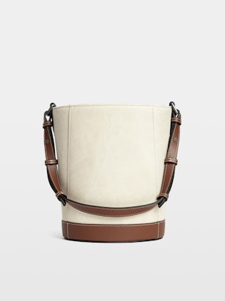 Z Bucket Voltaire Bag - Canvas and grained leather bucket bag with adjustable strap and wing signature.